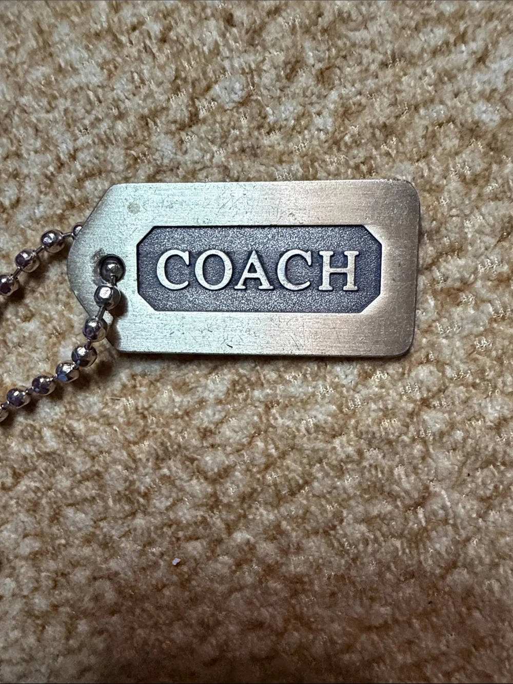 Coach Silver Brushed Metal Logo Tag Keychain